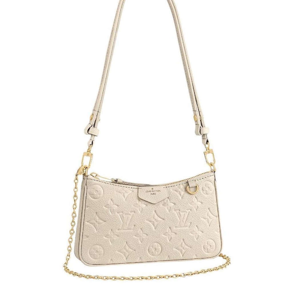 Luis Vuitton mini cream bag